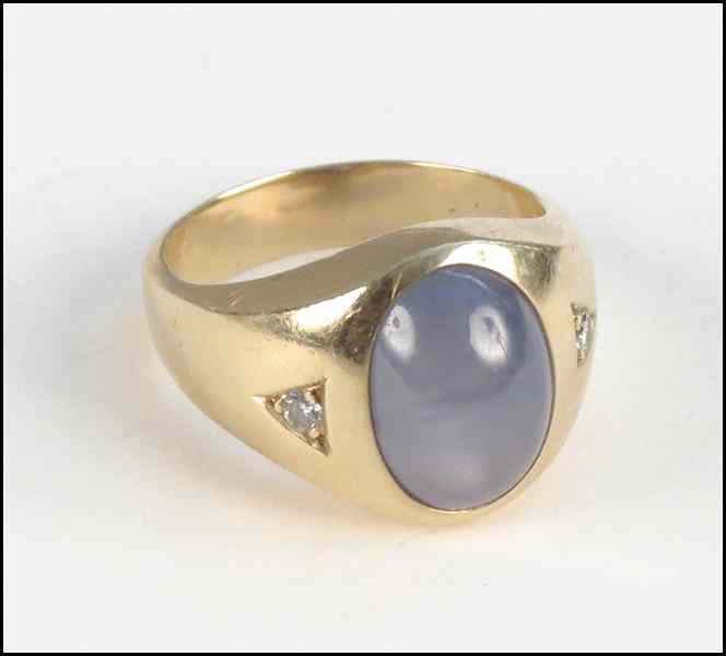 Appraisal: STAR SAPPHIRE DIAMOND AND KARAT YELLOW GOLD RING Cabochon star