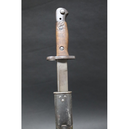 Appraisal: British Second Pattern with oil cleaning hole bayonet with scabbard