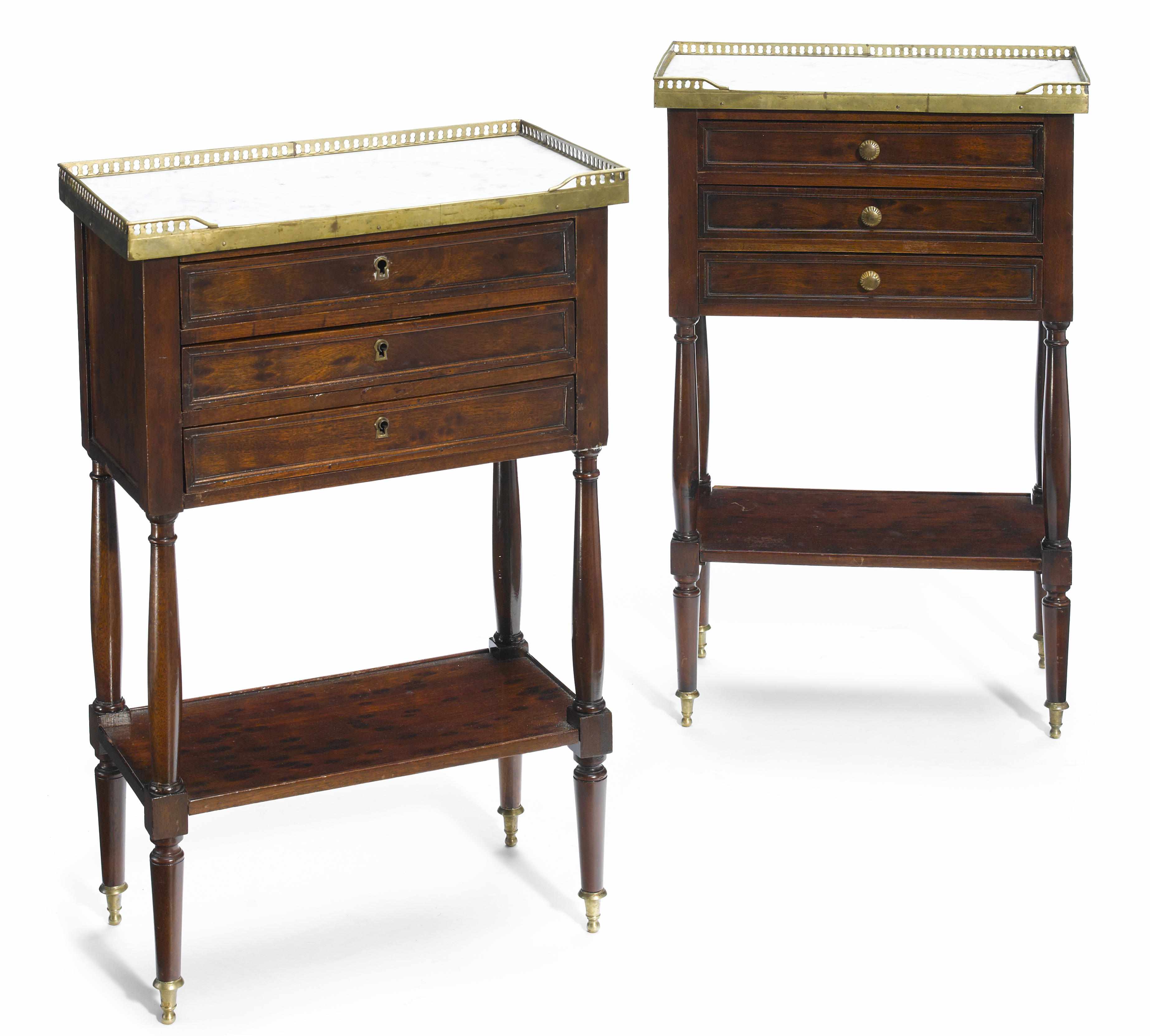 Appraisal: A pair of Directoire mahogany bedside tables Each with marble