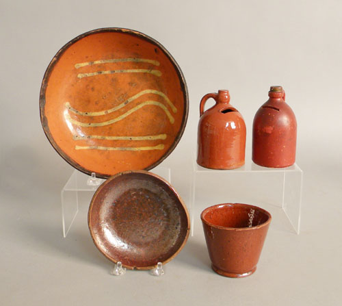 Appraisal: Two earthenware banks th c together with a small redware