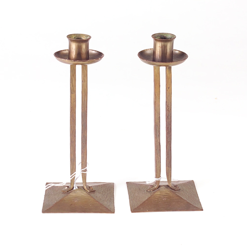 Appraisal: ROYCROFT Pair of brass-washed hammered copper Princess candlesticks in wood