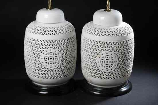 Appraisal: PAIR CHINESE BLANC-DE-CHINE PORCELAIN RETICULATED VASES Electrified - in high