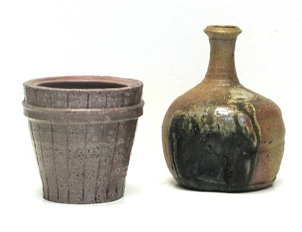 Appraisal: Two Japanese earthenware vessels The first a raku style glazed