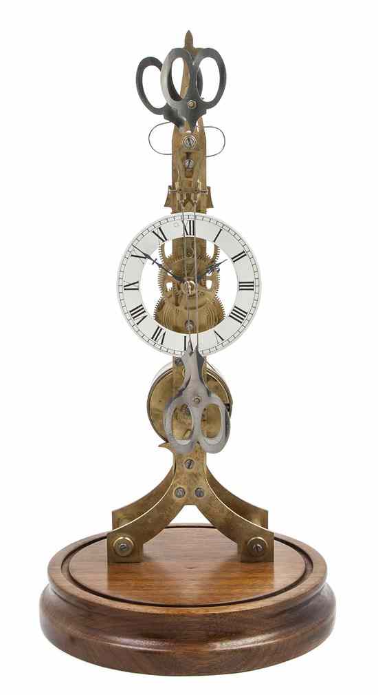 Appraisal: A Brass Skeleton Clock having twin pendulums before the enameled