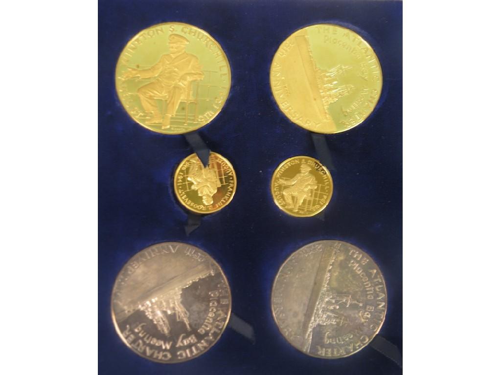 Appraisal: A gold and silver presentation set of medallions made to