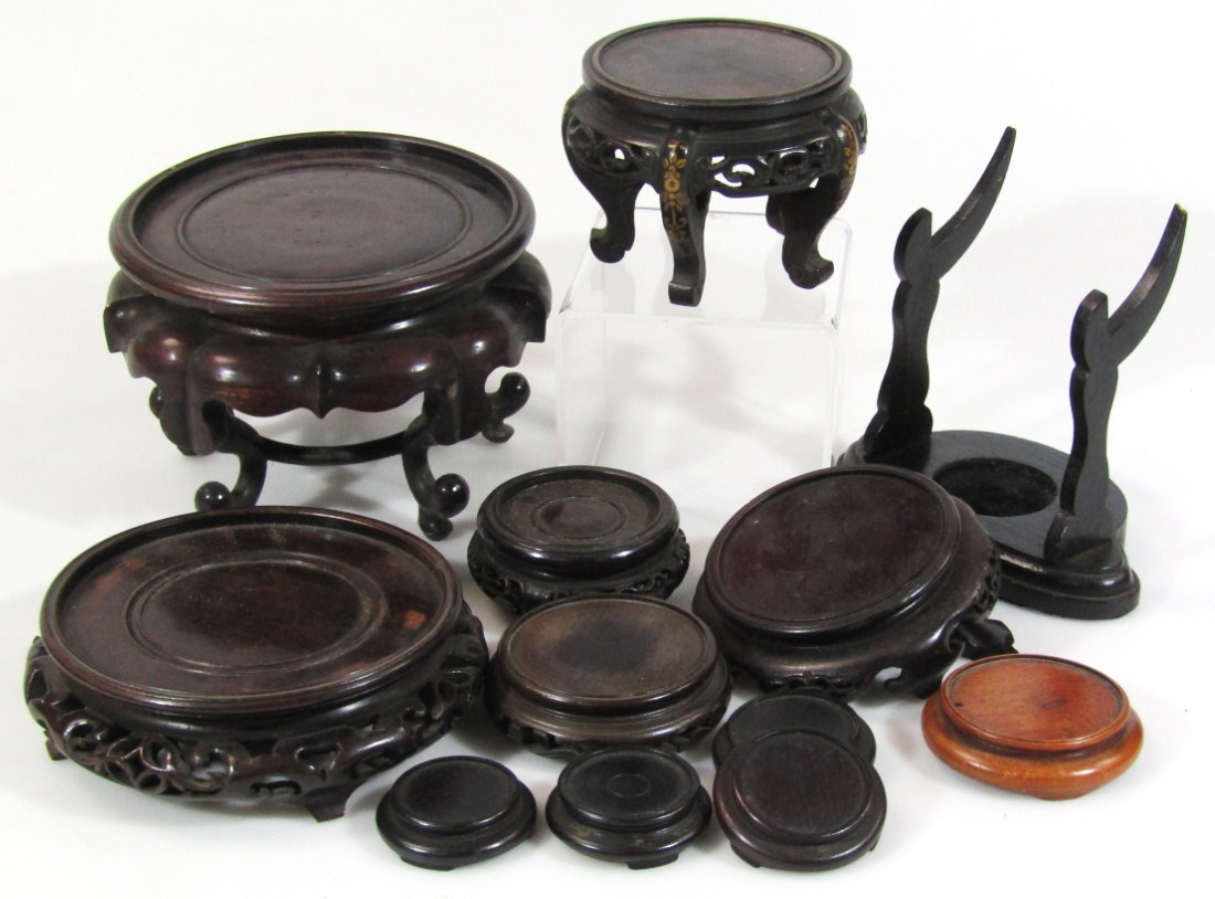 Appraisal: Various Chinese hardwood stands vase stands etc to include one