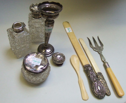 Appraisal: Two silver topped faceted glass toilet bottles Birmingham a silver