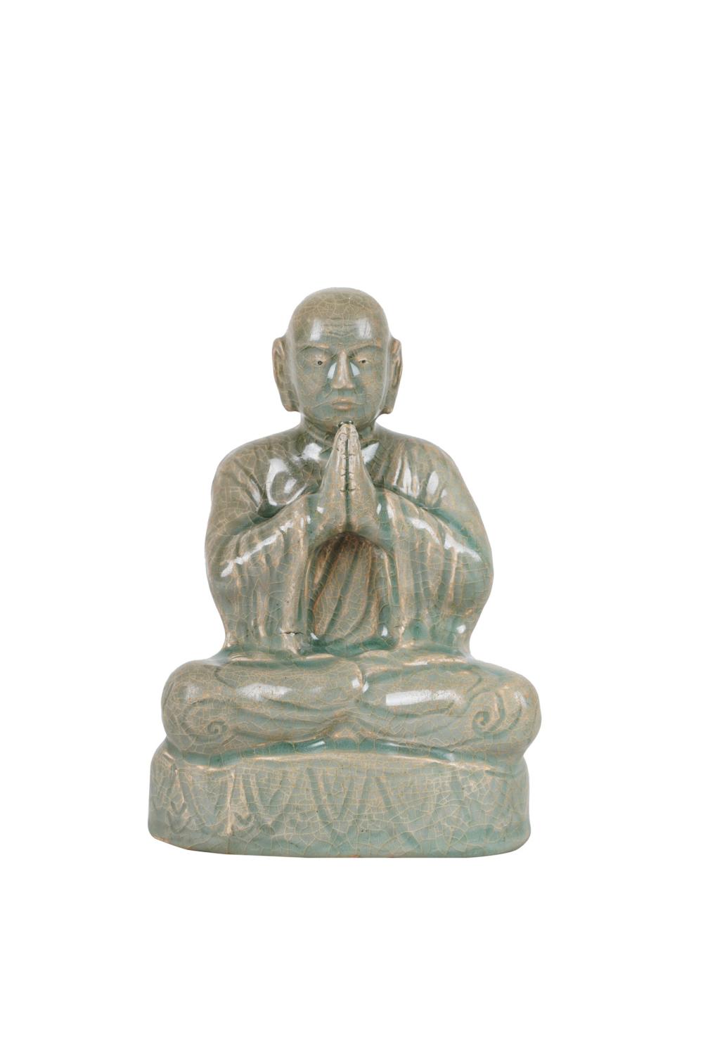 Appraisal: CELADON GLAZED PORCELAIN BUDDHACondition with craquelure to glaze throughout one