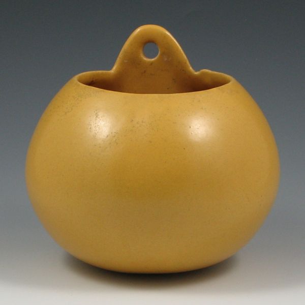 Appraisal: Camark ball wall pocket in semi-matte yellow Marked CAMARK Excellent