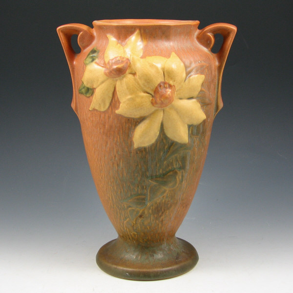 Appraisal: Roseville Clematis handled vase in brown Marked Roseville USA -