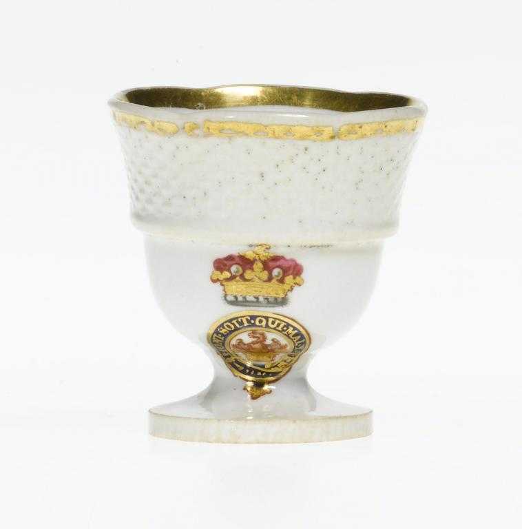 Appraisal: A DERBY CRESTED EGG CUP of bell shape with osier