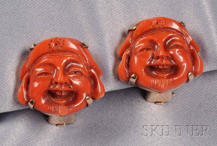 Appraisal: kt Gold and Coral Earclips each coral carving depicts a