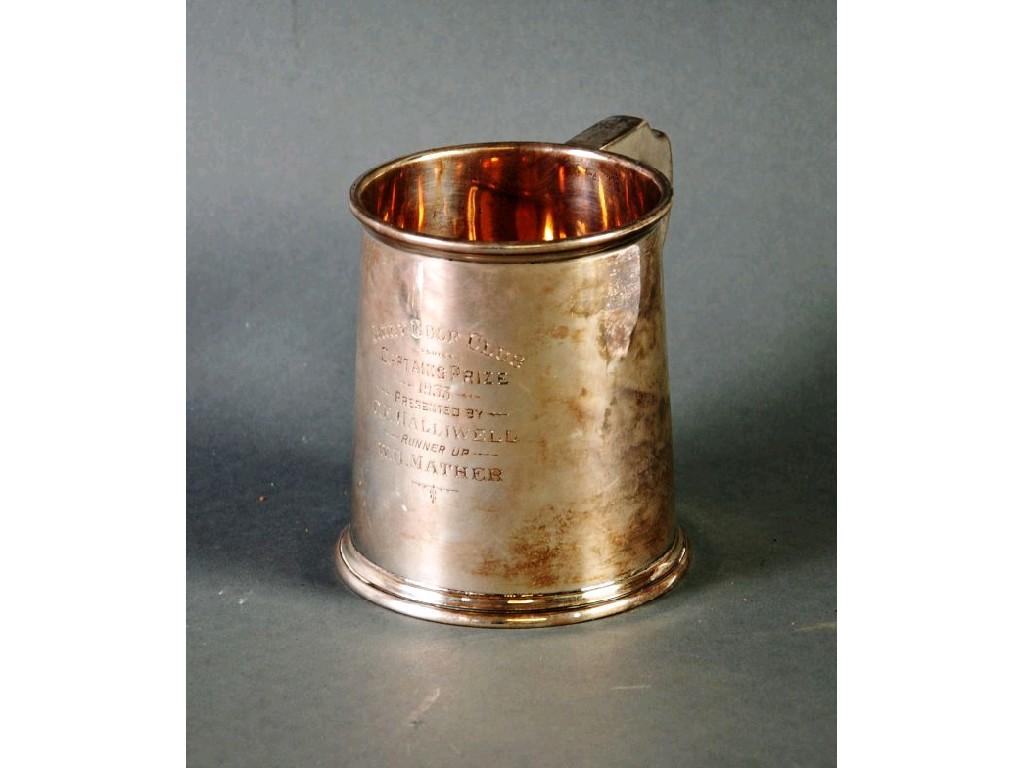 Appraisal: GEORGE V SILVER PRESENTATION TANKARD slightly tapering form with angular