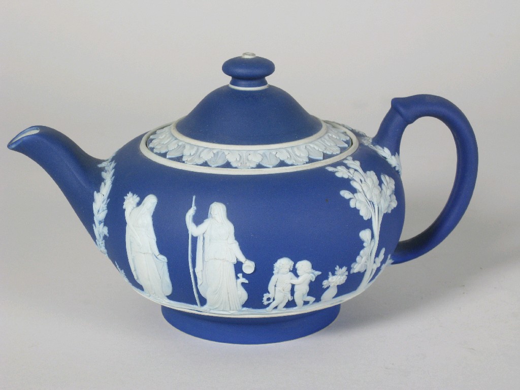 Appraisal: A th Century Wedgwood blue jasperware Teapot with frieze of