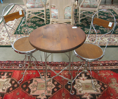 Appraisal: THREE-PIECE CAFE' TABLE AND CHAIR SET American th century the