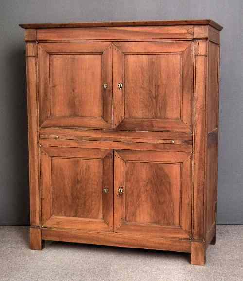 Appraisal: A late th early th Century French panelled walnut cupboard