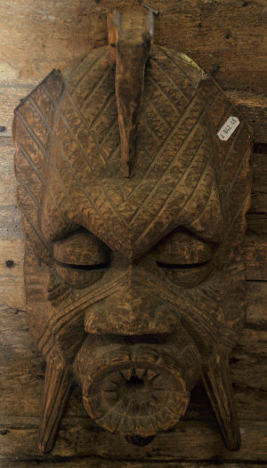 Appraisal: An African carved wood tribal mask of a demon