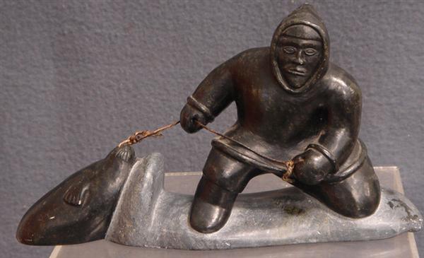 Appraisal: NW Native American carved blackstone figure of a seal hunter