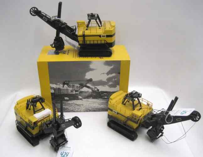 Appraisal: THREE CONRAD MODEL P H ELECTRIC MINING SHOVELS diecast construction