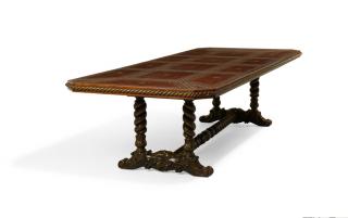 Appraisal: A JACOBEAN STYLE LIBRARY TABLE WITH TOOLED LEATHER TOP A