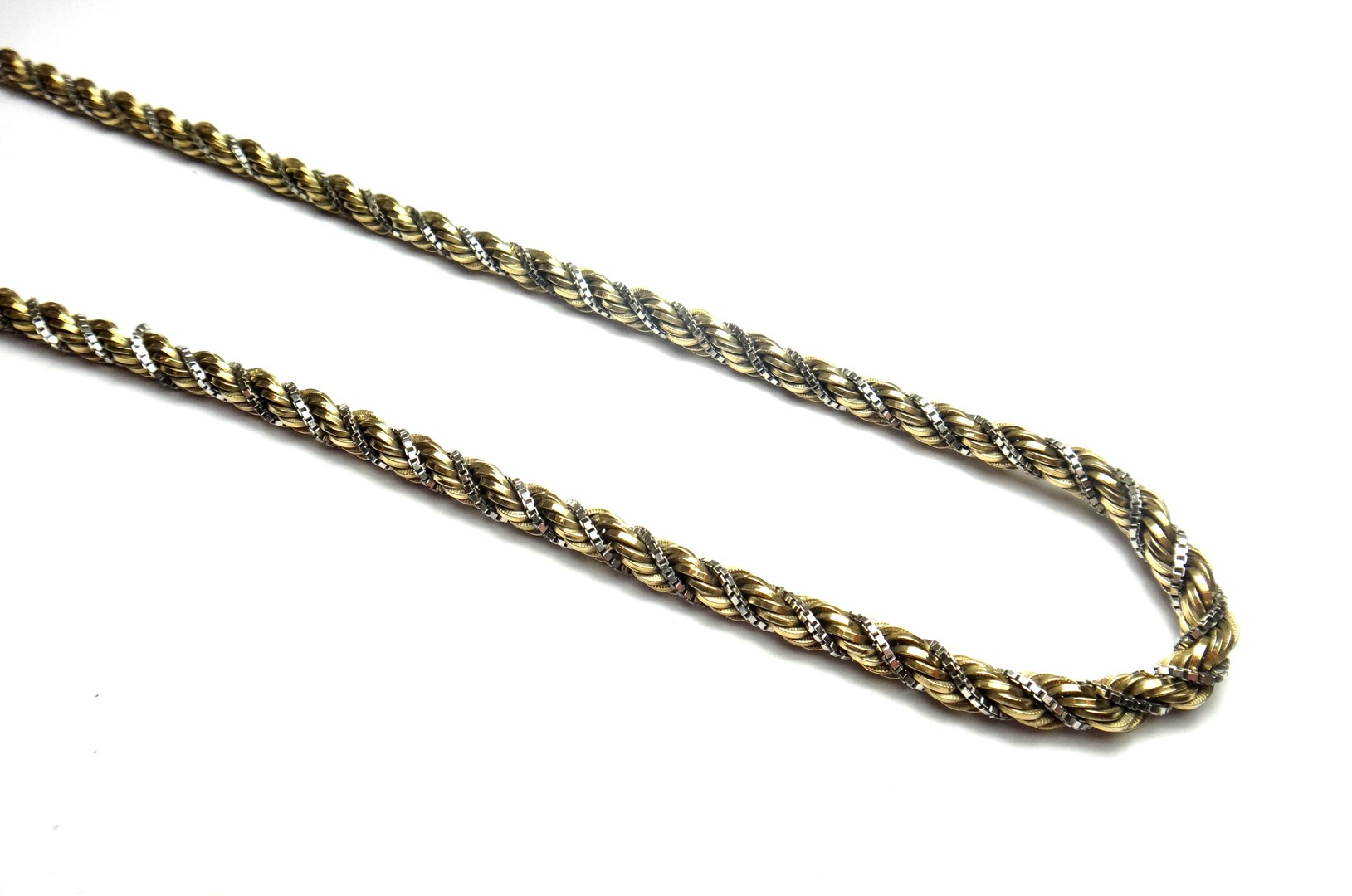 Appraisal: A ct two colour gold ropetwist link neckchain on a