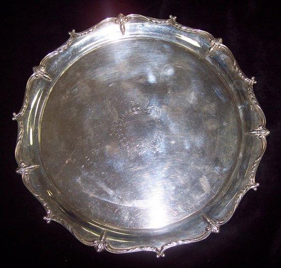 Appraisal: A circular salver with scrolling border engraved a cartouche Birmingham