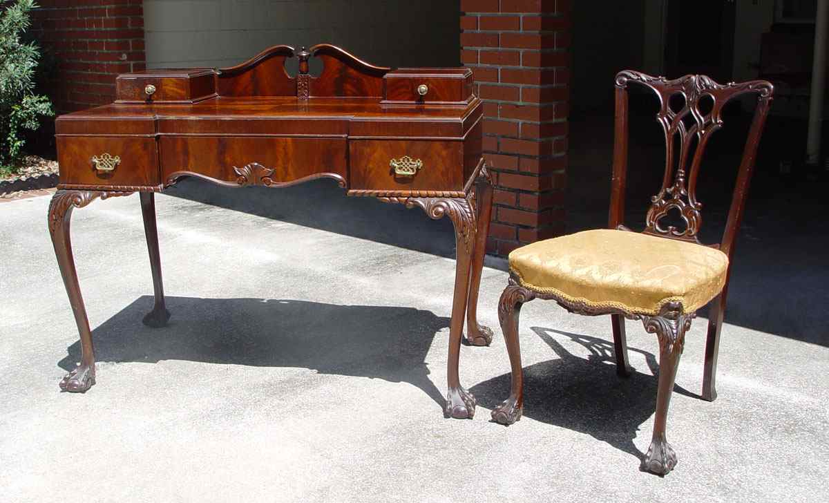 Appraisal: MAHOGANY CHIPPENDALE STYLE DESK AND CHAIR To include Desk with