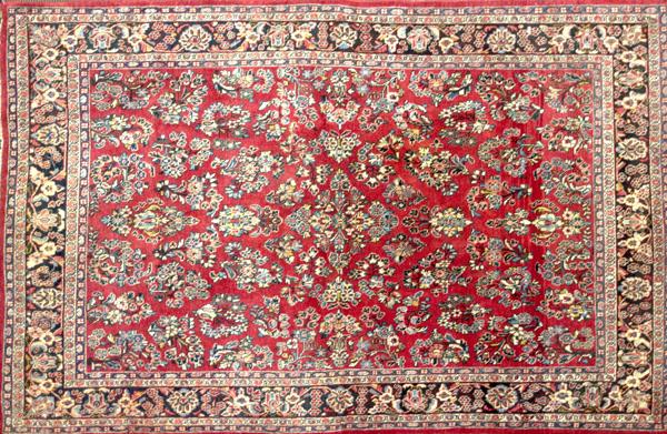 Appraisal: SAROUK Area rug with red ground and all over design