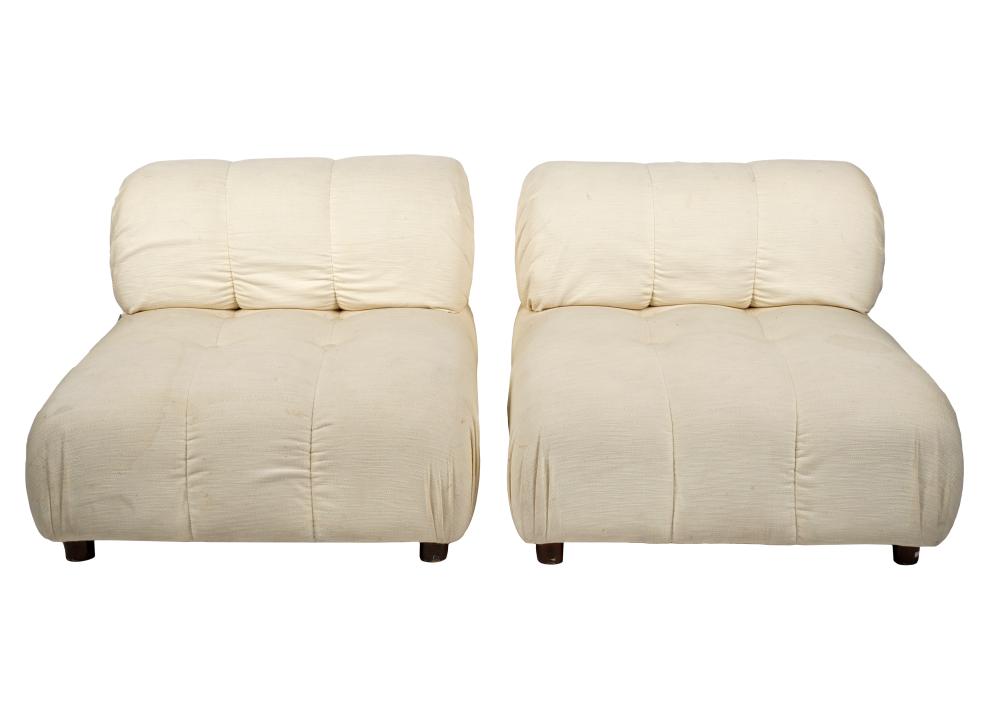 Appraisal: TWO MODERN UPHOLSTERED CHAIRSunsigned covered with textured off-white fabric on