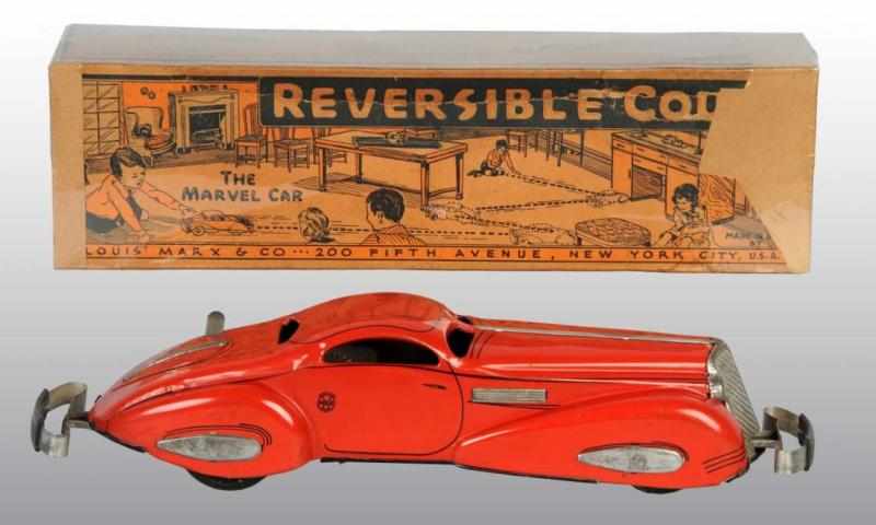 Appraisal: Tin Marx Reversible Coupe Wind-Up Toy Description American Working Minor