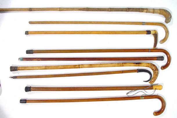 Appraisal: Seven walking sticks and one sword stick one with an