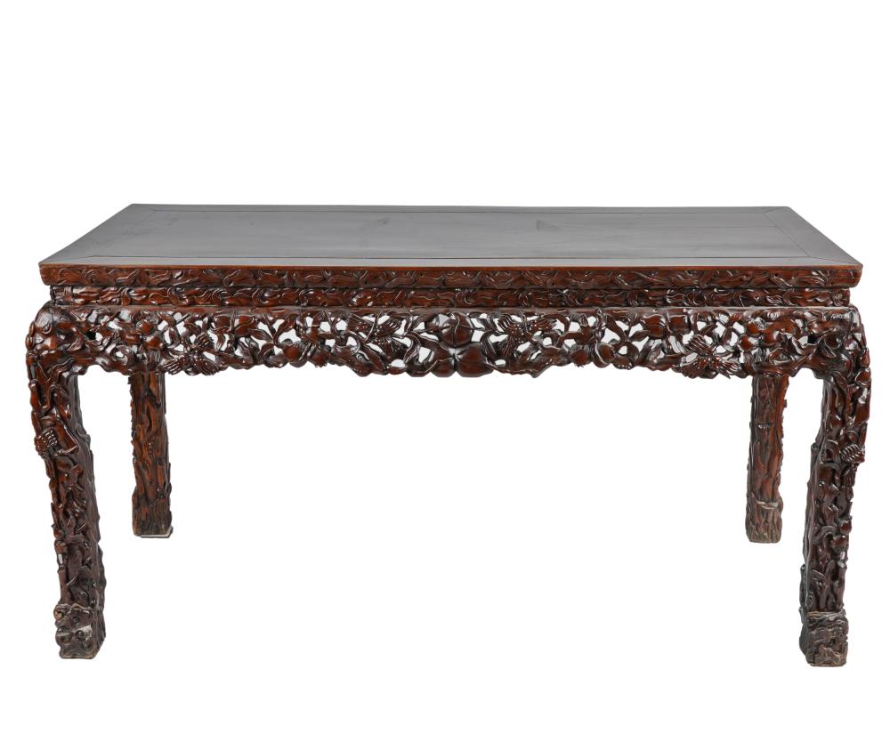 Appraisal: CARVED CHINESE HARDWOOD TABLErectangular with pierced frieze Condition a repair