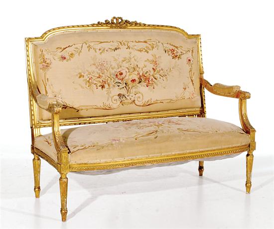 Appraisal: Louis XVI style carved giltwood and tapestry loveseat late th