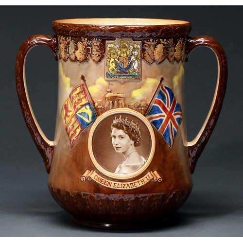 Appraisal: A Royal Doulton commemorative earthenware loving cup decorated to either