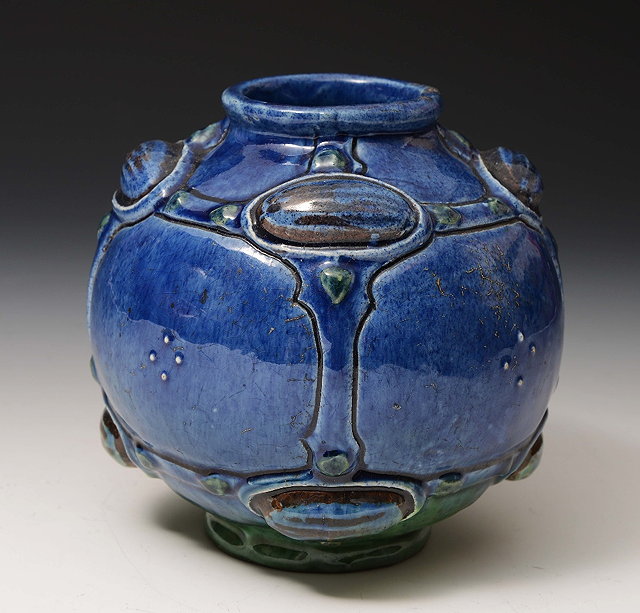 Appraisal: A Brannam ware Devonia vaseof stylised globular form with blue