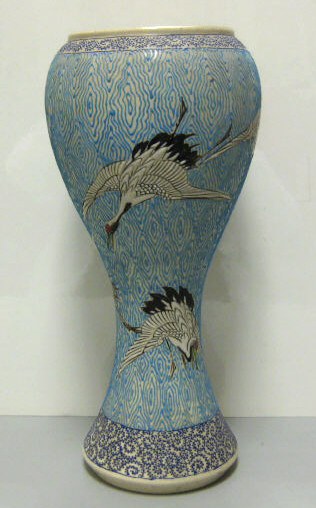 Appraisal: JAPANESE STONEWARE VASE Gourd form with raised enamel decoration of