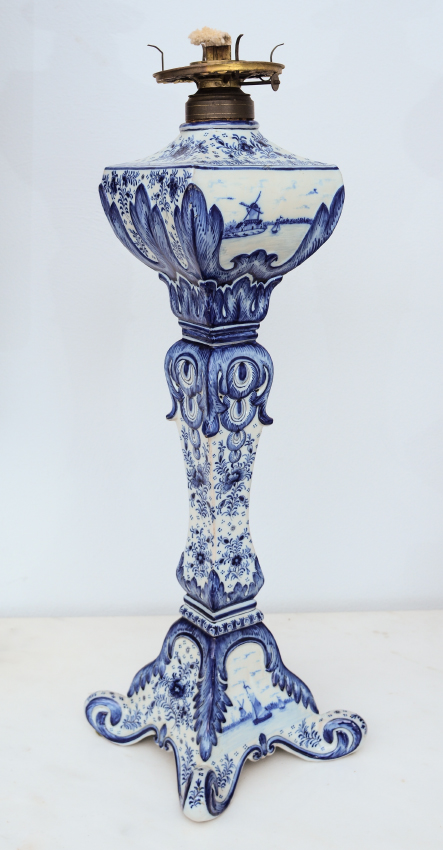 Appraisal: TALL FRENCH DELFT STYLE FAIENCE OIL LAMP Blue and white