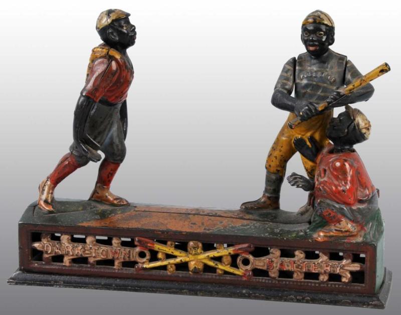 Appraisal: Cast Iron Darktown Battery Mechanical Bank Description Manufactured by J