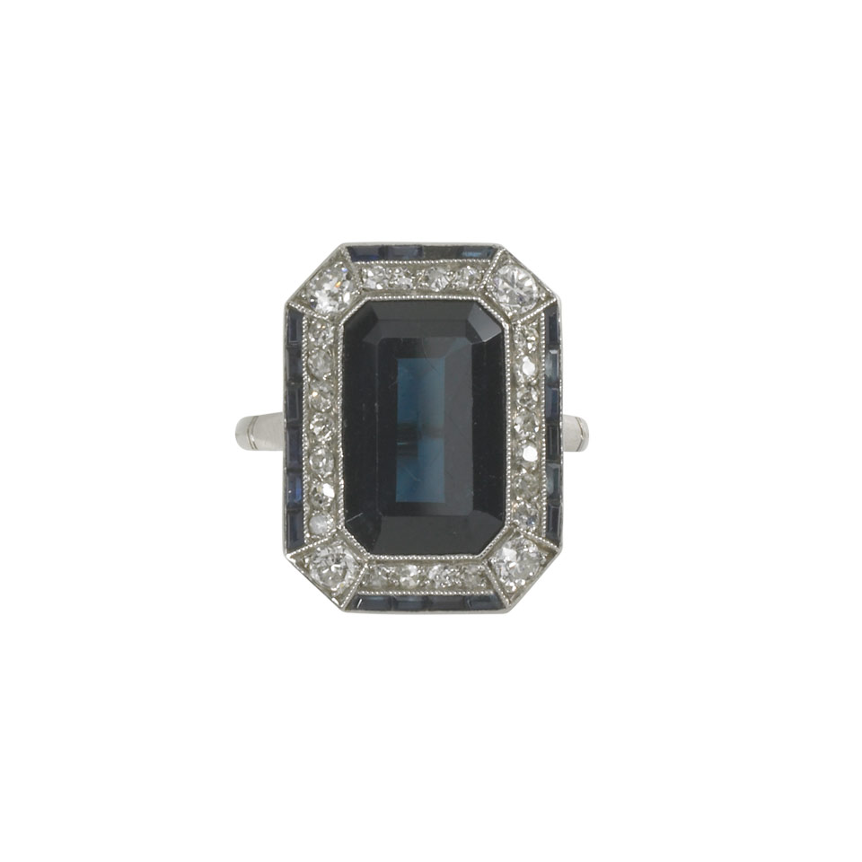 Appraisal: Platinum Filigree Ring set with an emerald cut sapphire approx