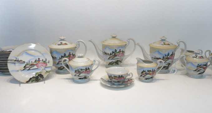 Appraisal: JAPANESE HAND PAINTED DESSERT SET sixty-three pieces comprised of teacups