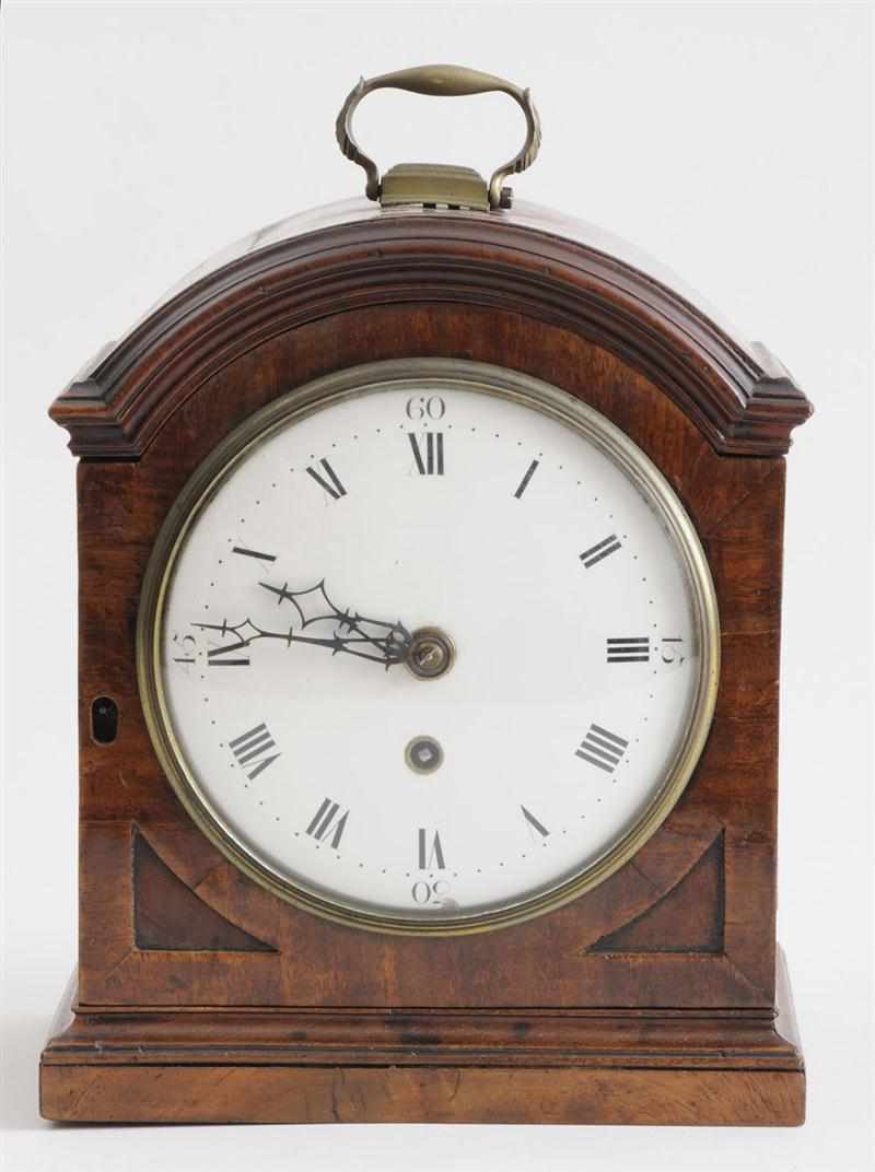 Appraisal: REGENCY MAHOGANY SMALL MANTLE CLOCK The engraved brass back plate