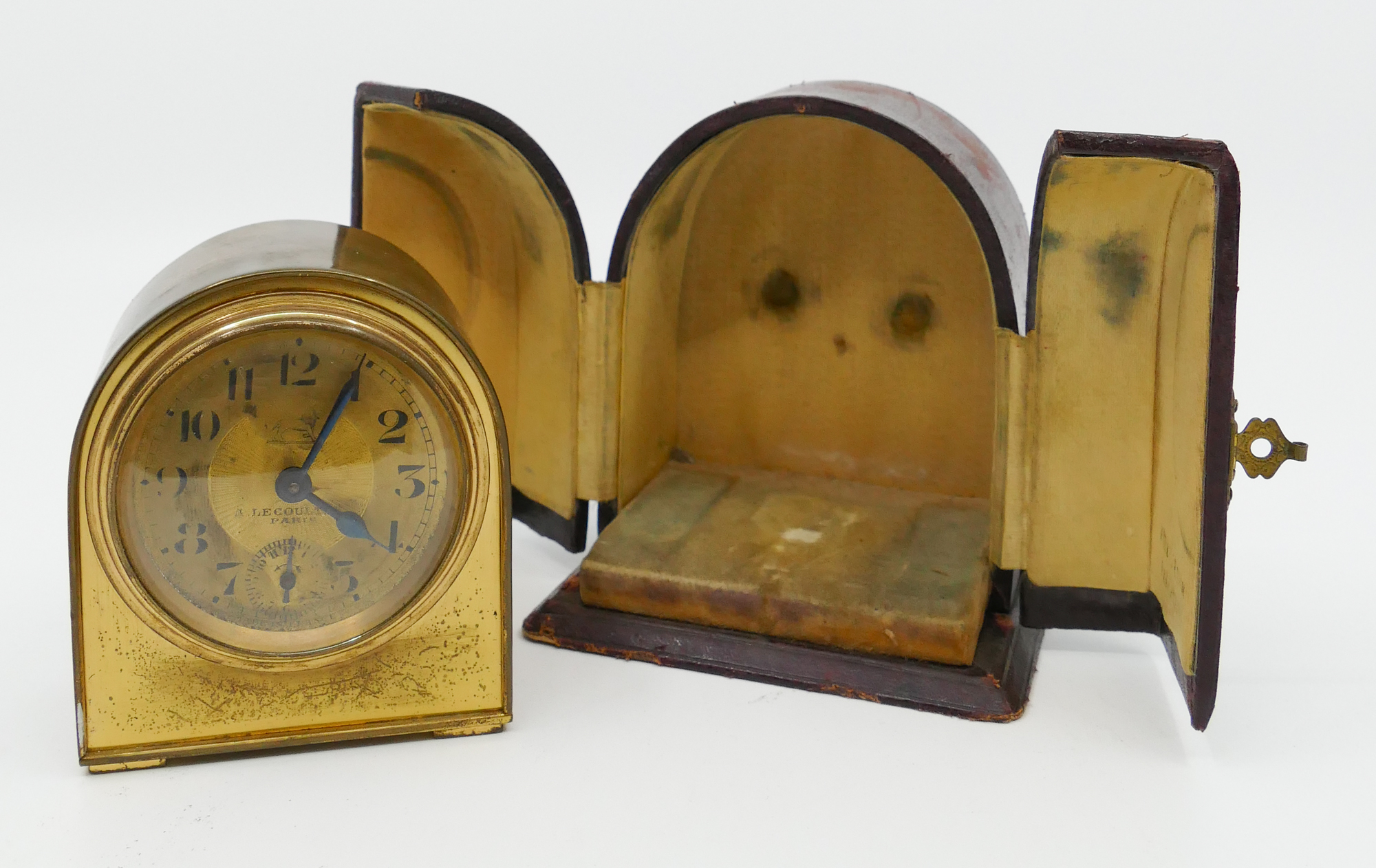 Appraisal: Duverdrey Bloquel Brass Travel Alarm Clock in Original Leather Case