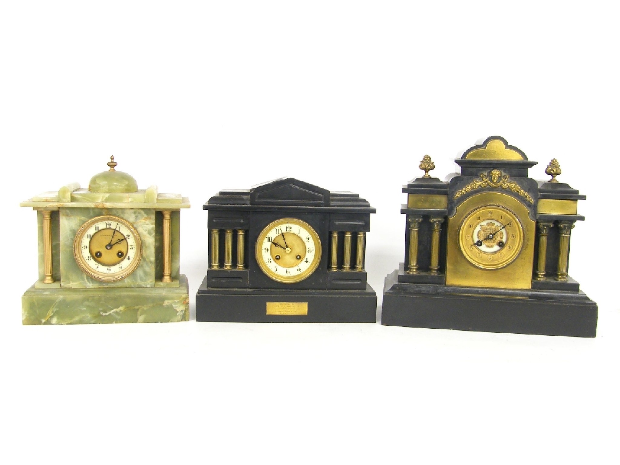 Appraisal: Two similar black slate two train temple case mantel clocks