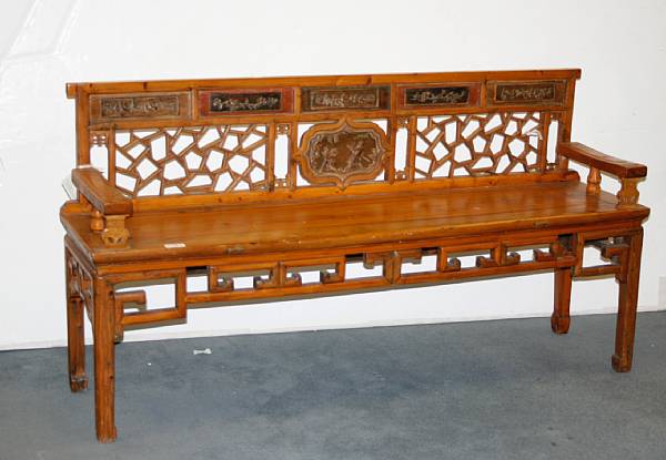 Appraisal: Two Chinese soft wood benches The larger a settee with