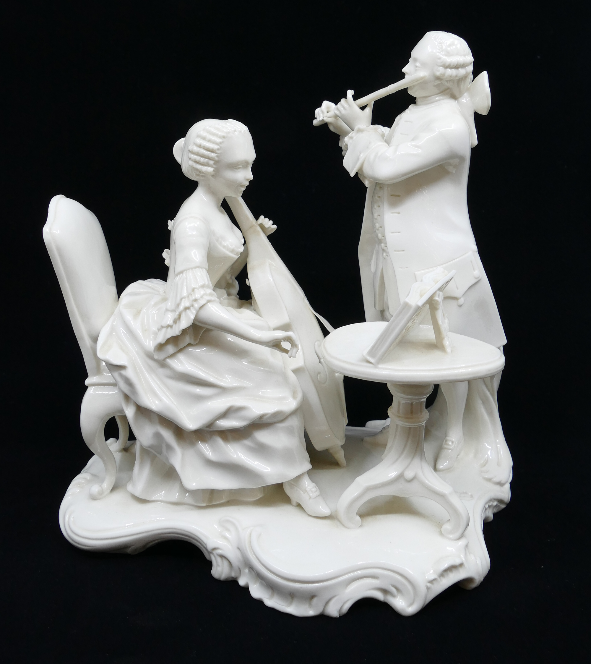 Appraisal: Nymphenburg Musicians Blanc de Chine Porcelain Figure Group Depicts seated