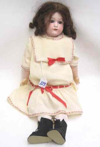 Appraisal: 'JUTTA'' CHILD DOLL by Simon Halbig having brown fixed eyes