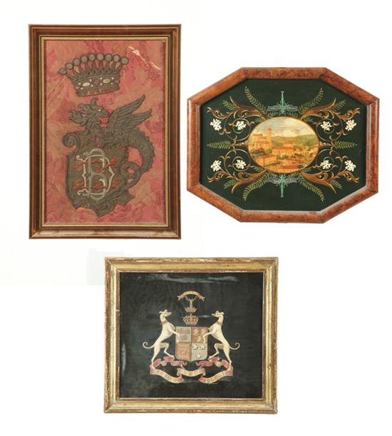 Appraisal: TWO FRAMED TEXTILES AND A PAINTING Twentieth century Two armorial