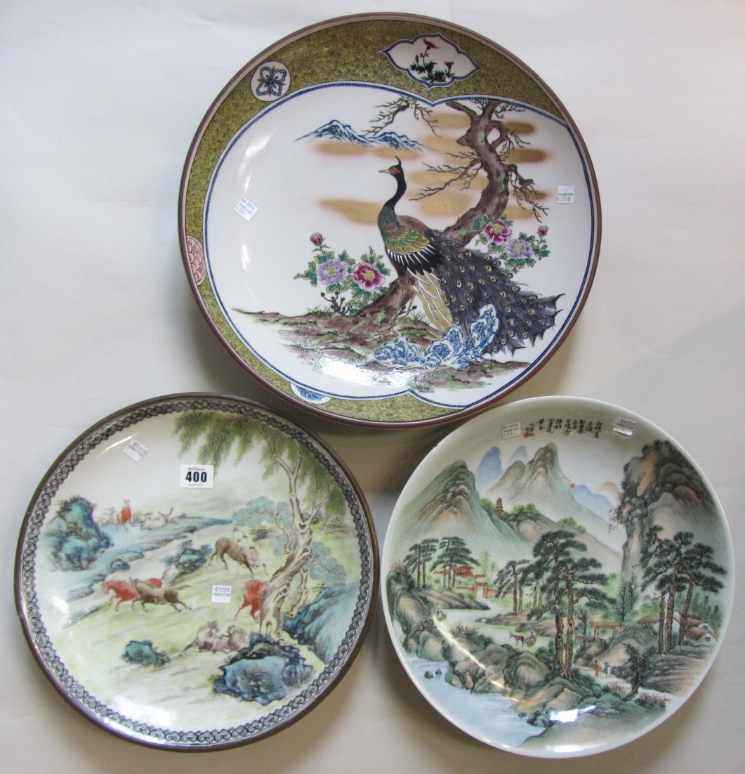 Appraisal: A Chinese porcelain dish th century painted with travellers in