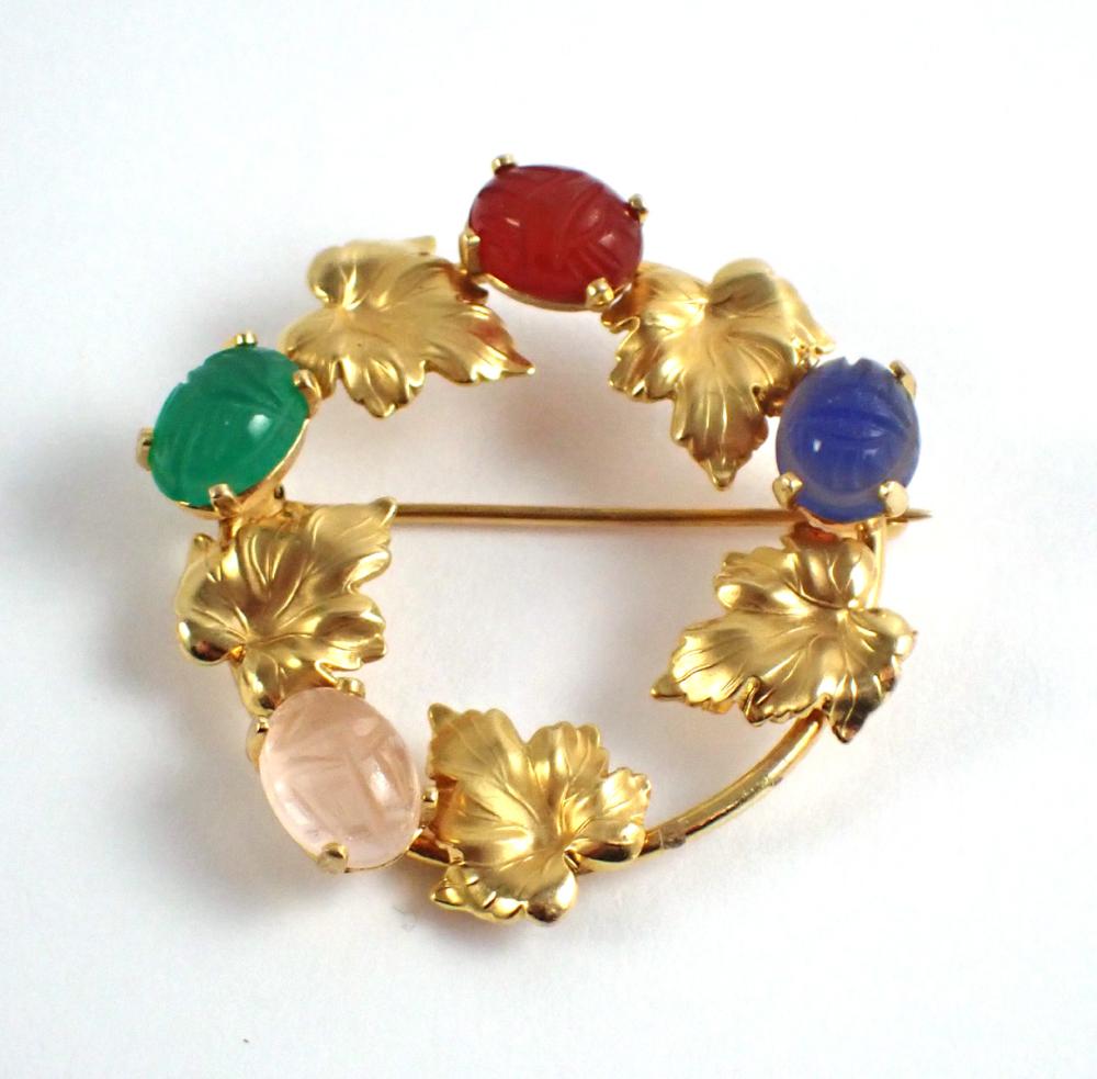 Appraisal: INTAGLIO GLASS AND FOURTEEN KARAT GOLD PIN The round k