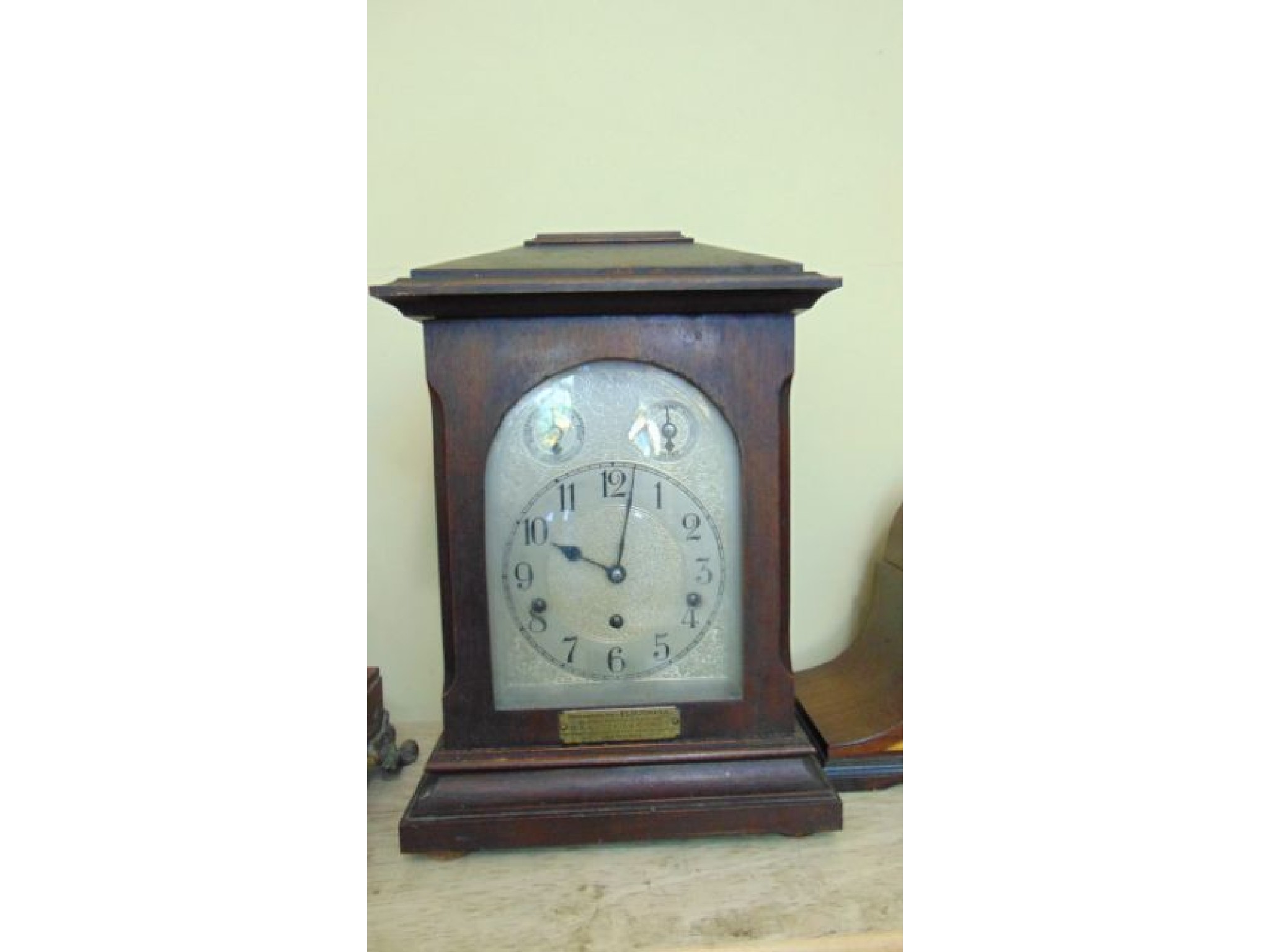 Appraisal: A s mahogany bracket clock with simple case with arched